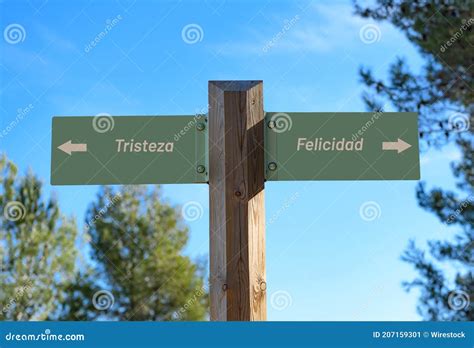 Street Sign Pointing Opposite Directions for "Tristeza " and "Felicidad ...