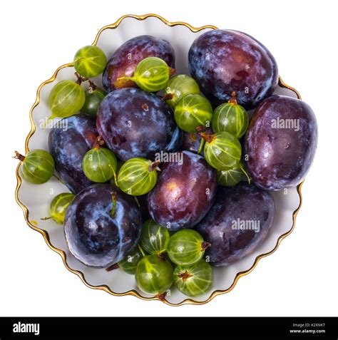 Healthy eating-gooseberry and plum. Studio Photo Stock Photo - Alamy