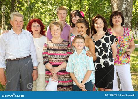 Family Of Nine People Pose At Park Stock Images - Image: 27108254