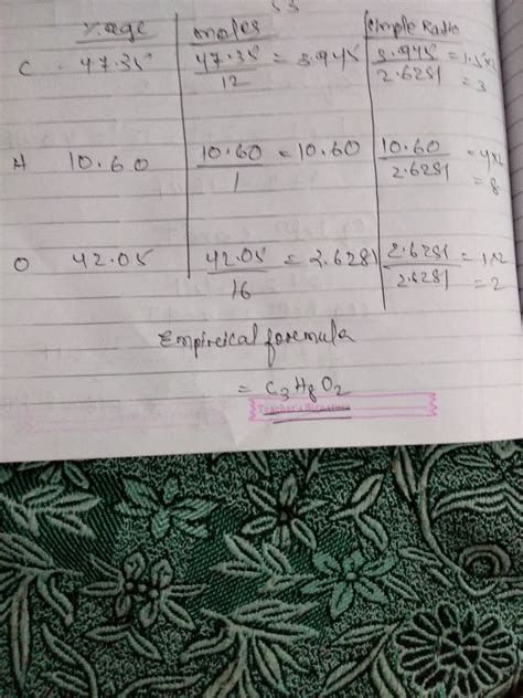 A molecule is found to contain 47.35 % c, 10.60 % h, and 42.05 % o ...
