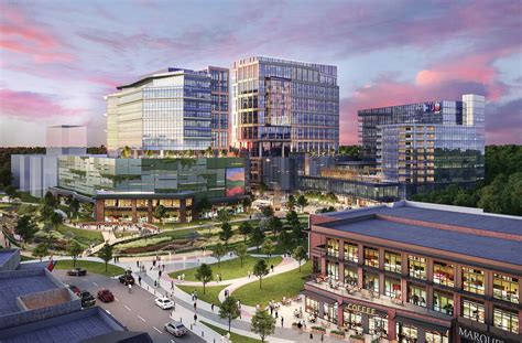 Modern business district featuring sleek office buildings and landscaped public spaces, representing managed IT services in Pennsylvania.