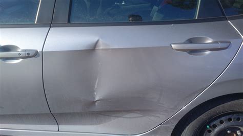 How to Remove Door Dings From Your Car - Premium Dent Repair