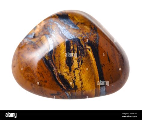 natural mineral gem stone - Tigers eye ( Tiger eye) gemstone isolated ...