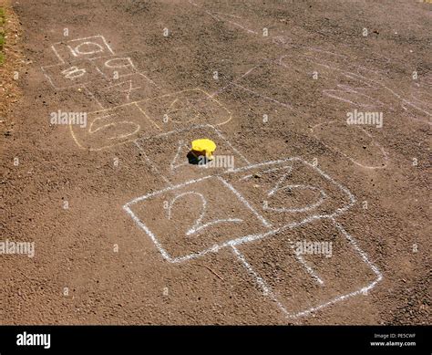 chalk beds or hopscotch children's game with marker on 4 four asphalt ...