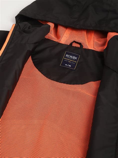 Buy Men Color Blocked Hooded Windbreaker Jacket | Richlook.in