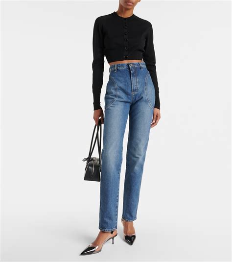 High-rise slim jeans in blue - Alaia | Mytheresa
