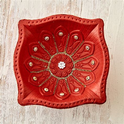 Buy Utsav Clay Embellished Akhand Diya from Home Centre at just INR 199.0
