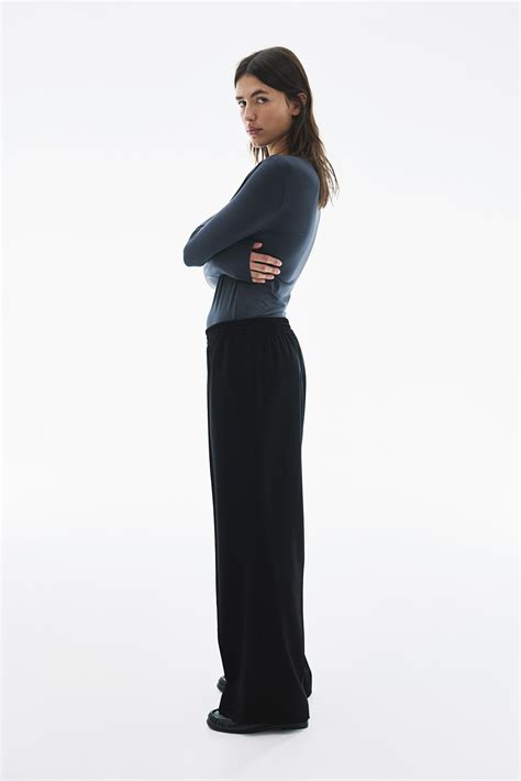 Wide crease-detail trousers - Black - Ladies | H&M IN
