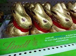 Image result for Easter Bunnies with Chocolate Eggs