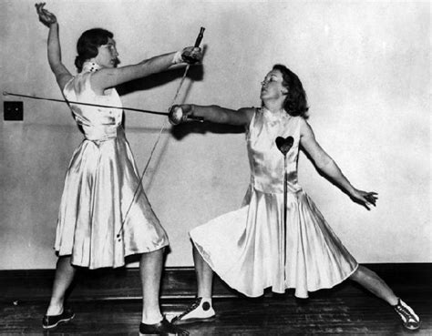 Four figures in action, including a man with a top knot crouching and shooting, a figure in a green