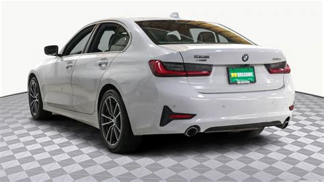 BMW 330I 2021 330i xDrive AUTO AC GR ELEC MAGS TOIT CAM RECULE usagée et d’occasion à vendre ...