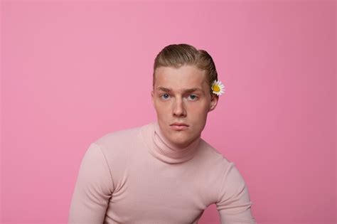 Front view man posing with flower | Free Photo