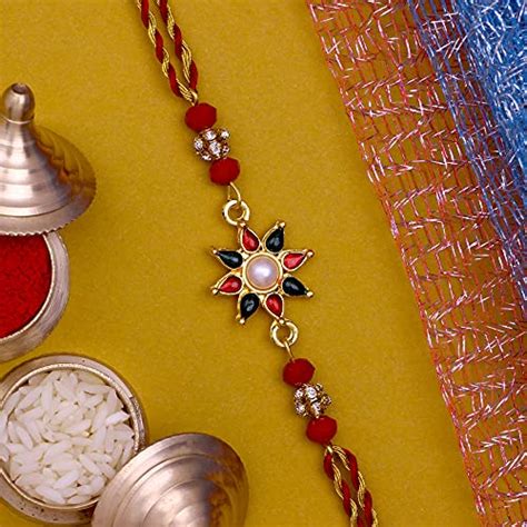 Mahi with Crystals and Beads Assorted Combo of Four Rakhis (Bracelet ...