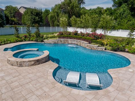 Free form pool designs swim mor pools and spas – Artofit