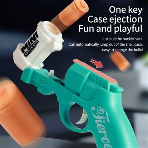 Goblin Style Shell Throwing Small Pistol Keychain Decompression Toy ...