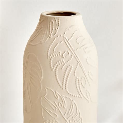 Buy Lets Garden Terracotta Embossed Vase from Home Centre at just INR 699.0