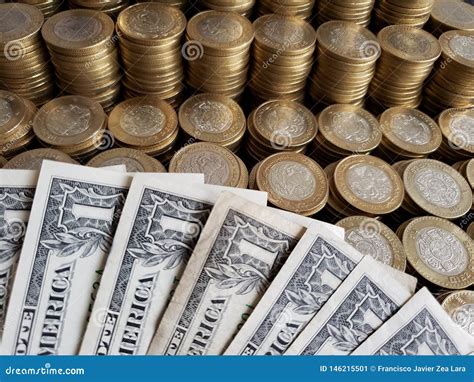 Approach To American Dollars Bills and Mexican Coins of Ten Pesos Stock ...