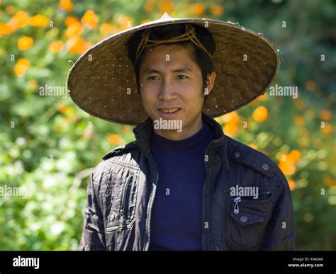 Asian style conical hat hi-res stock photography and images - Alamy