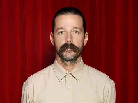 Shia LaBeouf dances with jail release paperwork in his mouth after arrest