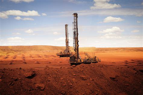 Onshore Drilling Rig Operating in Desert Landscape with Machinery and ...