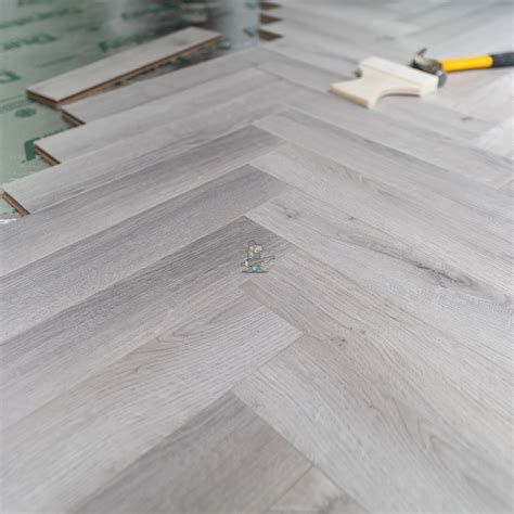 Craft 12mm Castle Grey Oak Herringbone AC5 Laminate Flooring