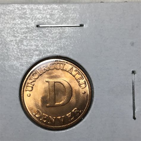 Denver Uncirculated penny? Found coin roll : r/coins