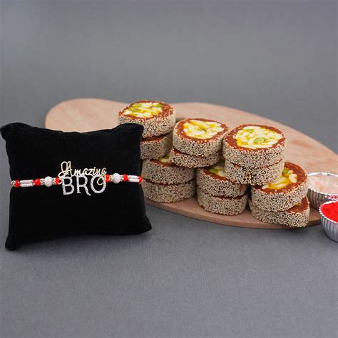 Send AD Amazing Bro Rakhi with Anjeer Cake Sweets Online | Rakhibazaar.com