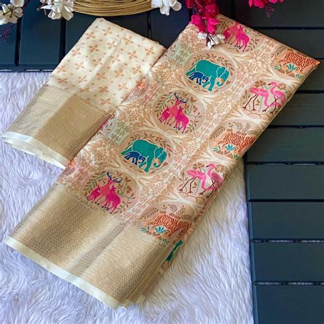 Off White Floral Zari Weaving Dola Silk Saree