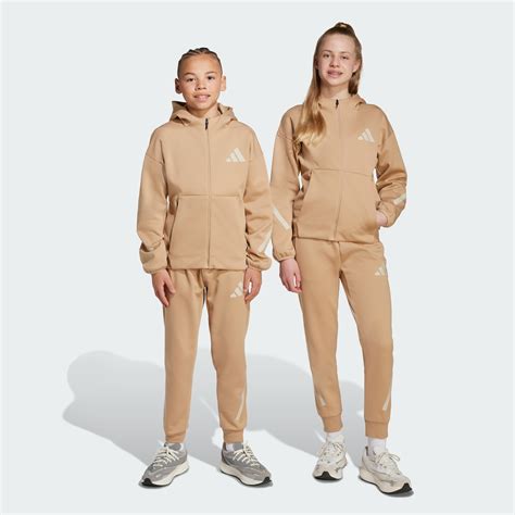 adidas Z.N.E. Tapered-Leg Pants - Brown | Free Shipping with adiClub