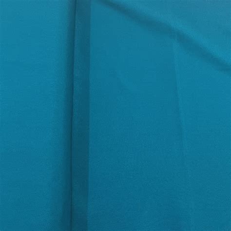 Buy Exclusive Teal Green Solid Malai Crepe Fabric Online – TradeUNO Fabrics