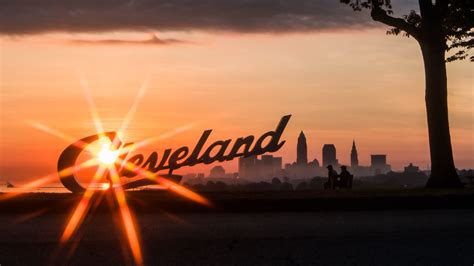 Wallpaper cleveland, night city, sunset, silhouettes, inscription ...