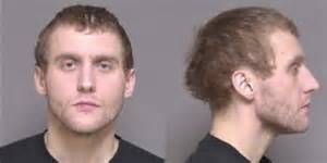Rochester man arrested after causing significant damage to squad car