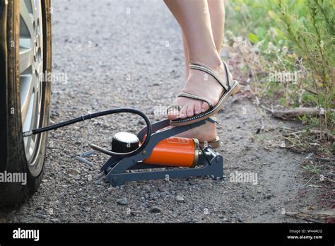 Woman Using a Foot Pump 的图像结果