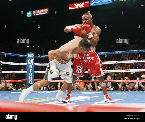 Las Vegas, Nevada, USA. 14th Dec, 2014. Boxers Amir Khan (white gloves ...