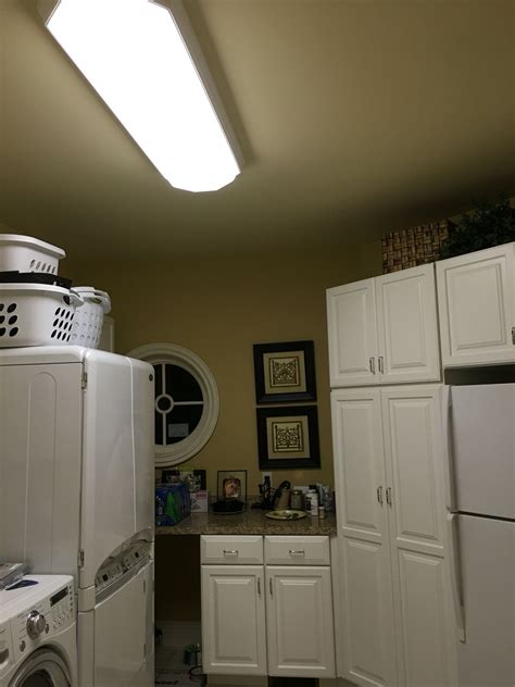 Brighten up your laundry room with this stylish ceiling light