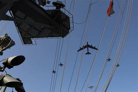 US aircraft carrier, B-52 — dispatched to Mideast over Iran — conduct ...