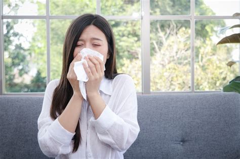 Beautiful woman long hair asian sick coughing or sneezing cover your ...