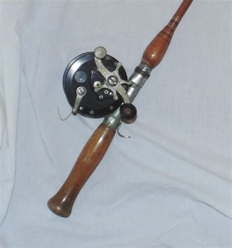 vintage-52-bamboo-fishing-rod-with-penn-85-reel-wood-handle ...