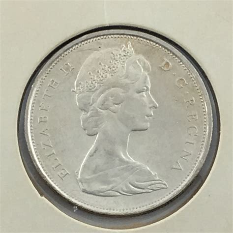 50 CENT PIECE (CANADIAN) * SILVER 1967*