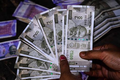 क्या आपकी जेब में रखे नोट में भी बना है ये स्टार? जानिए कितना खास है ये ...