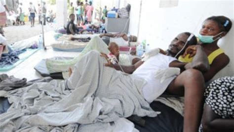 Haiti quake camps at risk as cholera death toll tops 200