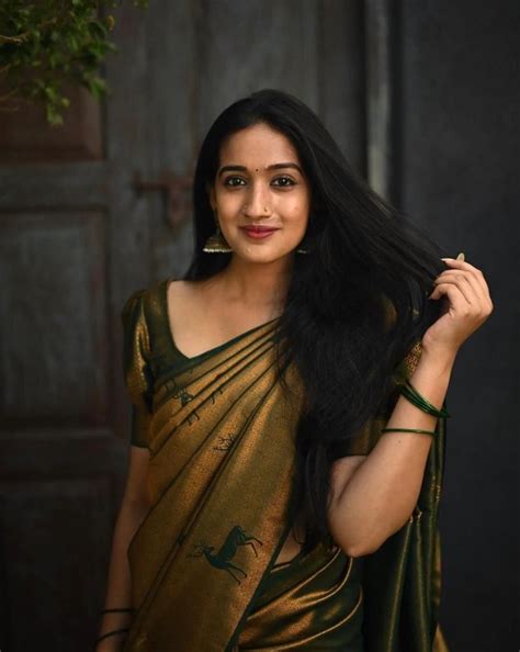 Luxuriant Dark Green Soft Silk Saree With Comely Blouse Piec