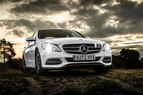 White Mercedes-benz Sedan · Free Stock Photo