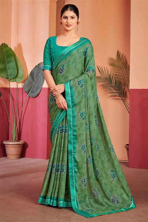Green Chiffon Saree Featuring Delicate Floral Prints & A Graceful Lace