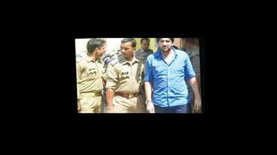 Guns & poses: How gangs are run from jail | Delhi News - Times of India