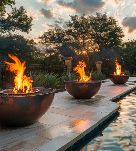 https://costacustompools.com/wp-content/uploads/2024/05/fire-bowls.jpg