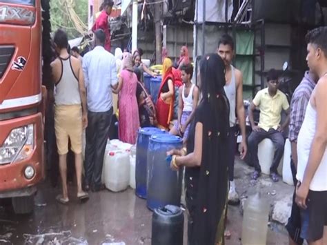 No end to Delhi's water crisis, long queues seen at tankers across the city