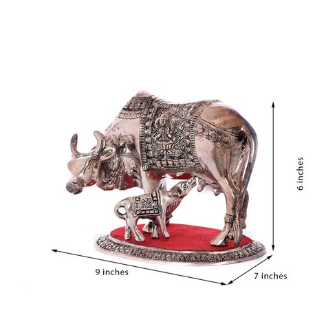 White Metal Cow And Calf Statue Online - eCraftIndia Online
