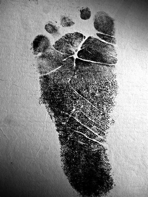 "Babys Stamp Foot": Black Photography by Rahmat Nugroho | ArtZolo.com