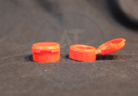 A T Manufacturing Co. - Tamper Evident Caps